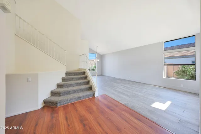 a kitchen with stainless steel appliances granite countertop a stove oven and a sink with granite countertops