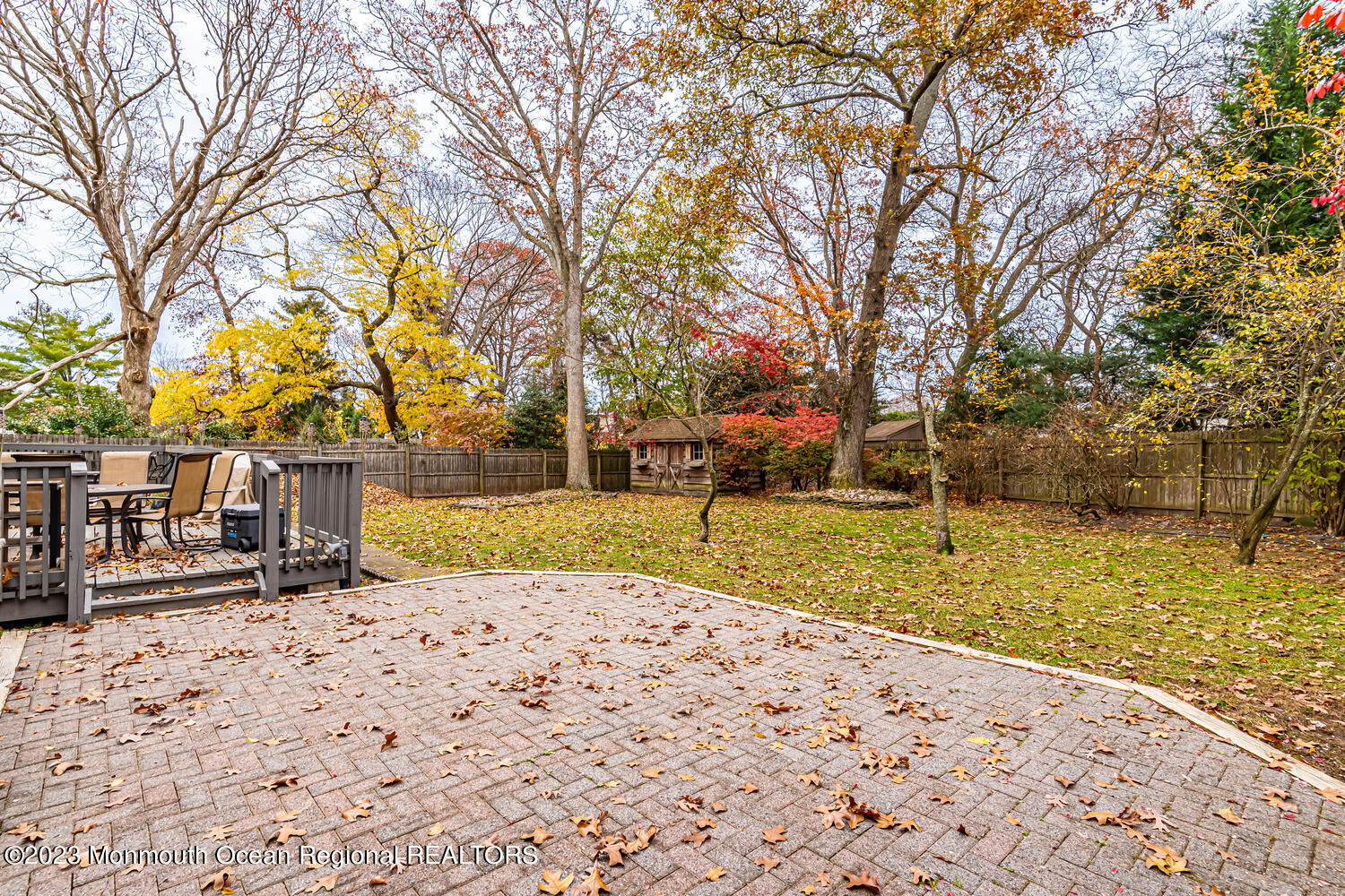 265 Sudbury Road Point Pleasant, NJ 08742 - Photo 33 of 47 a view of a yard with a tree