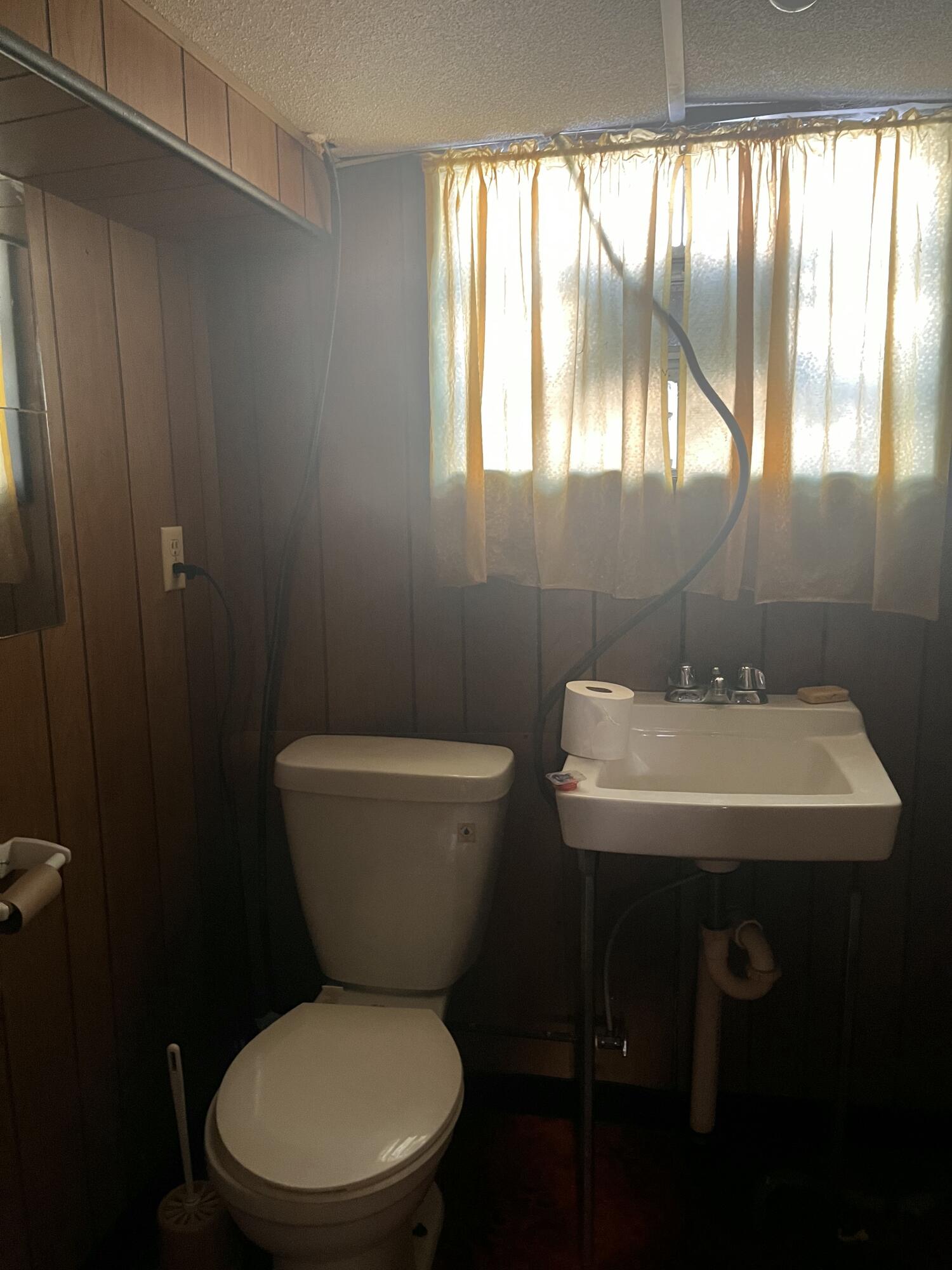 1752 Hayes Street Gary, IN 46404 - Photo 25 of 26 a bathroom with a toilet a sink and a window