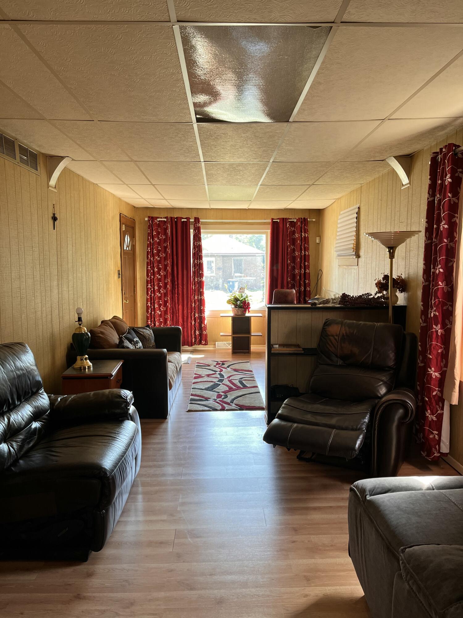 1752 Hayes Street Gary, IN 46404 - Photo 3 of 26 a living room with furniture and a wooden floor