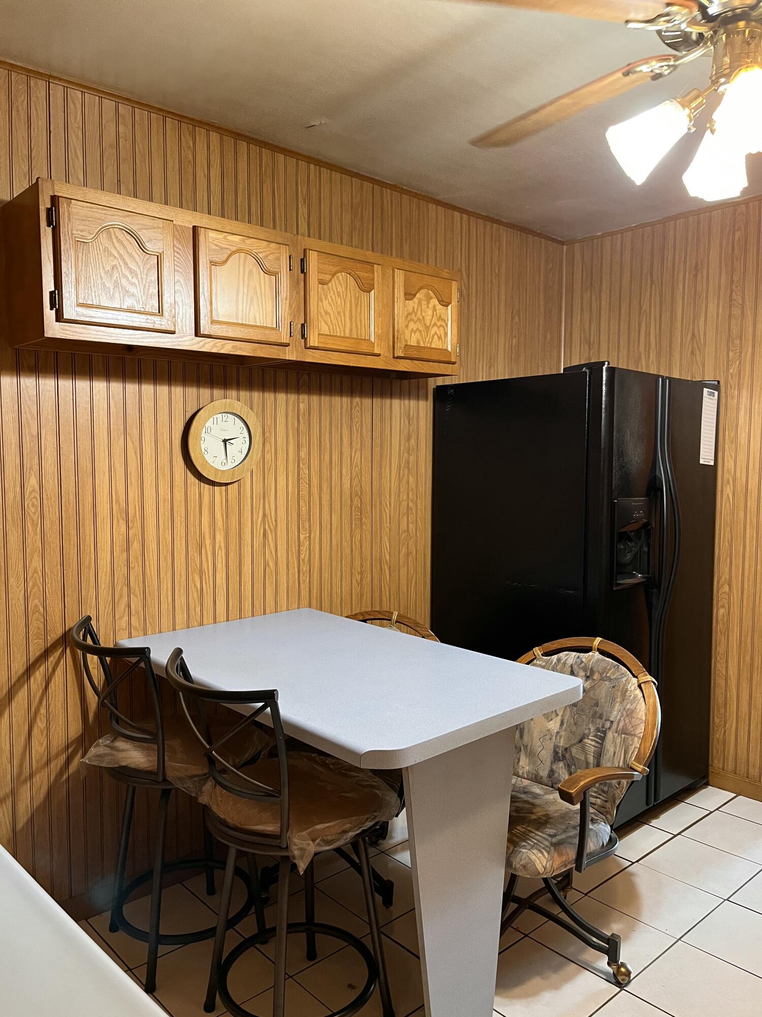 1752 Hayes Street Gary, IN 46404 - Photo 10 of 26 a table that has a table and a chair in it