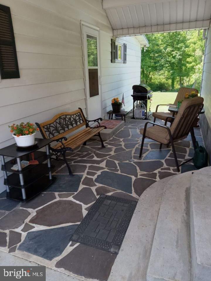24265 Path Valley Road Concord, PA 17217 - Photo 36 of 36 Breezeway in the summer