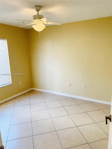 a view of a room with a window