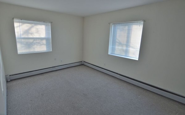 19 Winter Street, Unit 1 Boston, MA 02122 - Photo 4 of 6 an empty room with a window