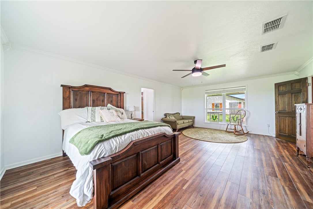 501 South County Road 1140 Riviera, TX 78379 - Photo 19 of 40 Expansive first-floor primary bedroom offering ove