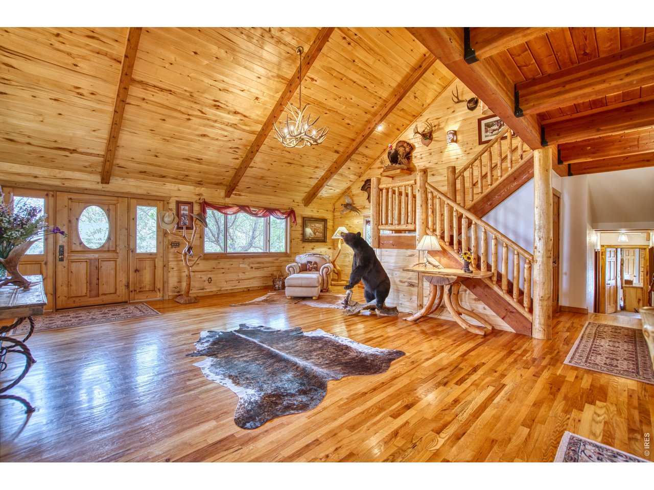 320 Del Monte Road Berthoud, CO 80513 - Photo 11 of 40 a view of an entryway with wooden floor