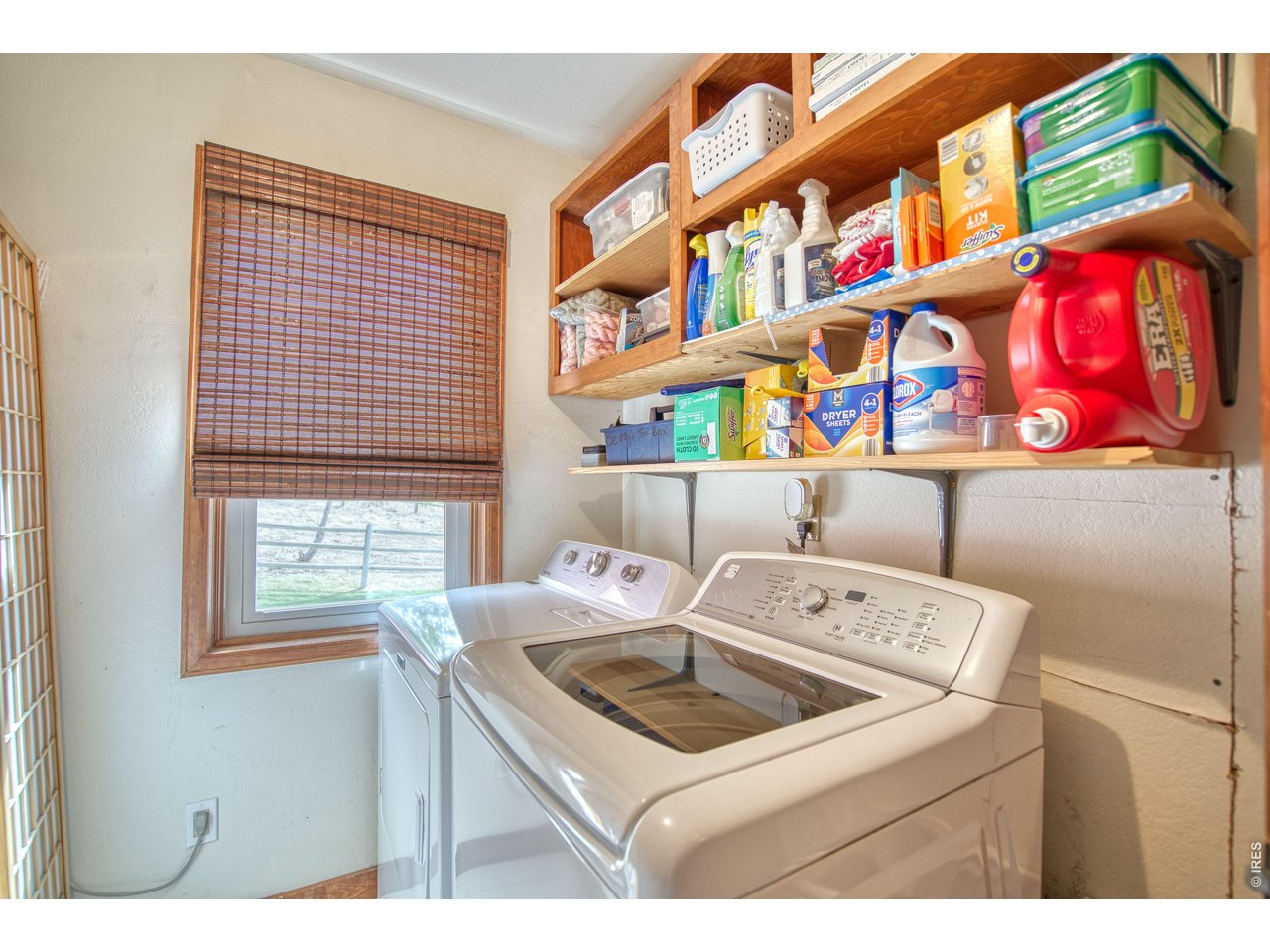 320 Del Monte Road Berthoud, CO 80513 - Photo 28 of 40 a utility room with dryer and washer