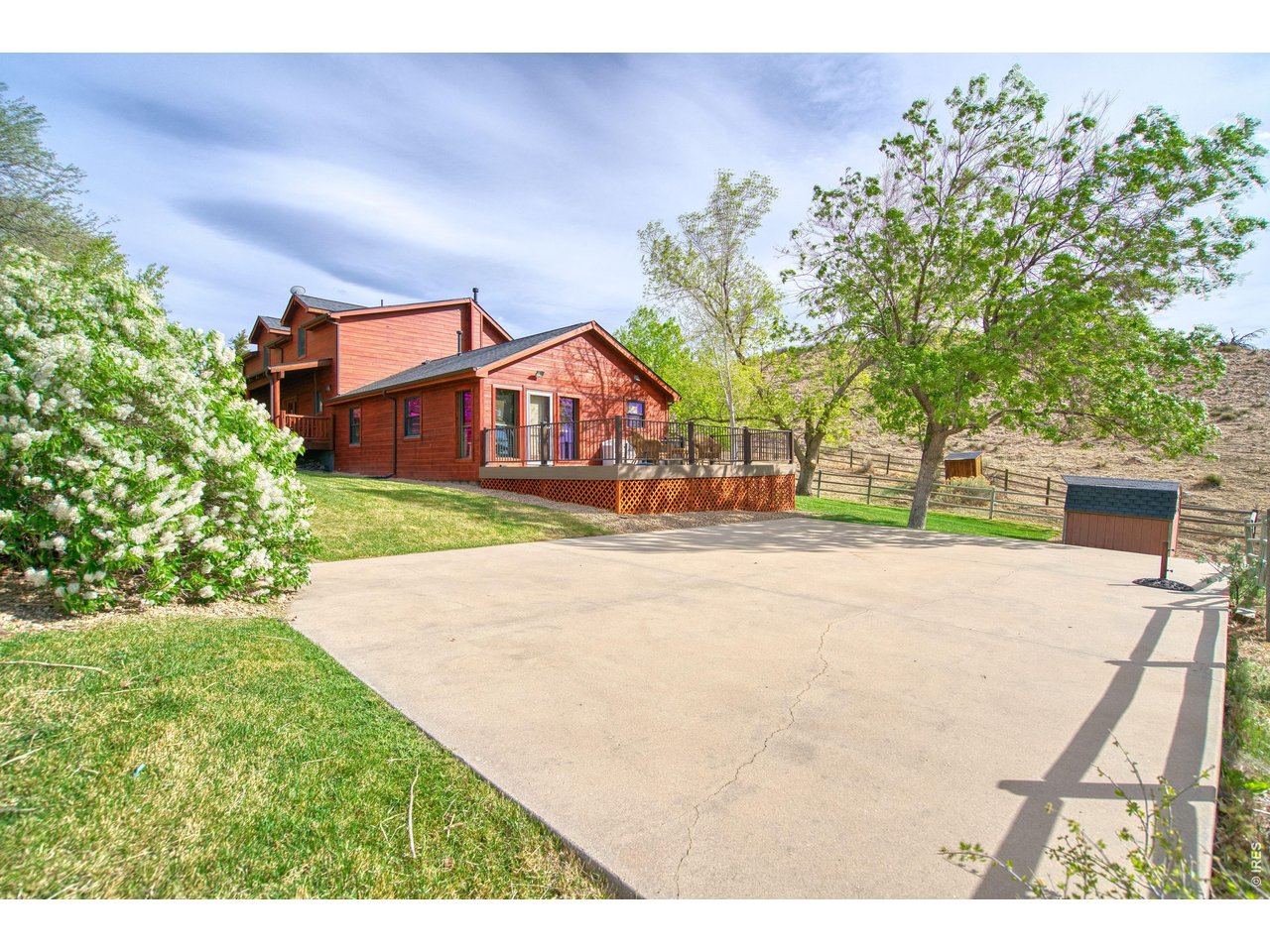 320 Del Monte Road Berthoud, CO 80513 - Photo 4 of 40 front view of a house with a yard