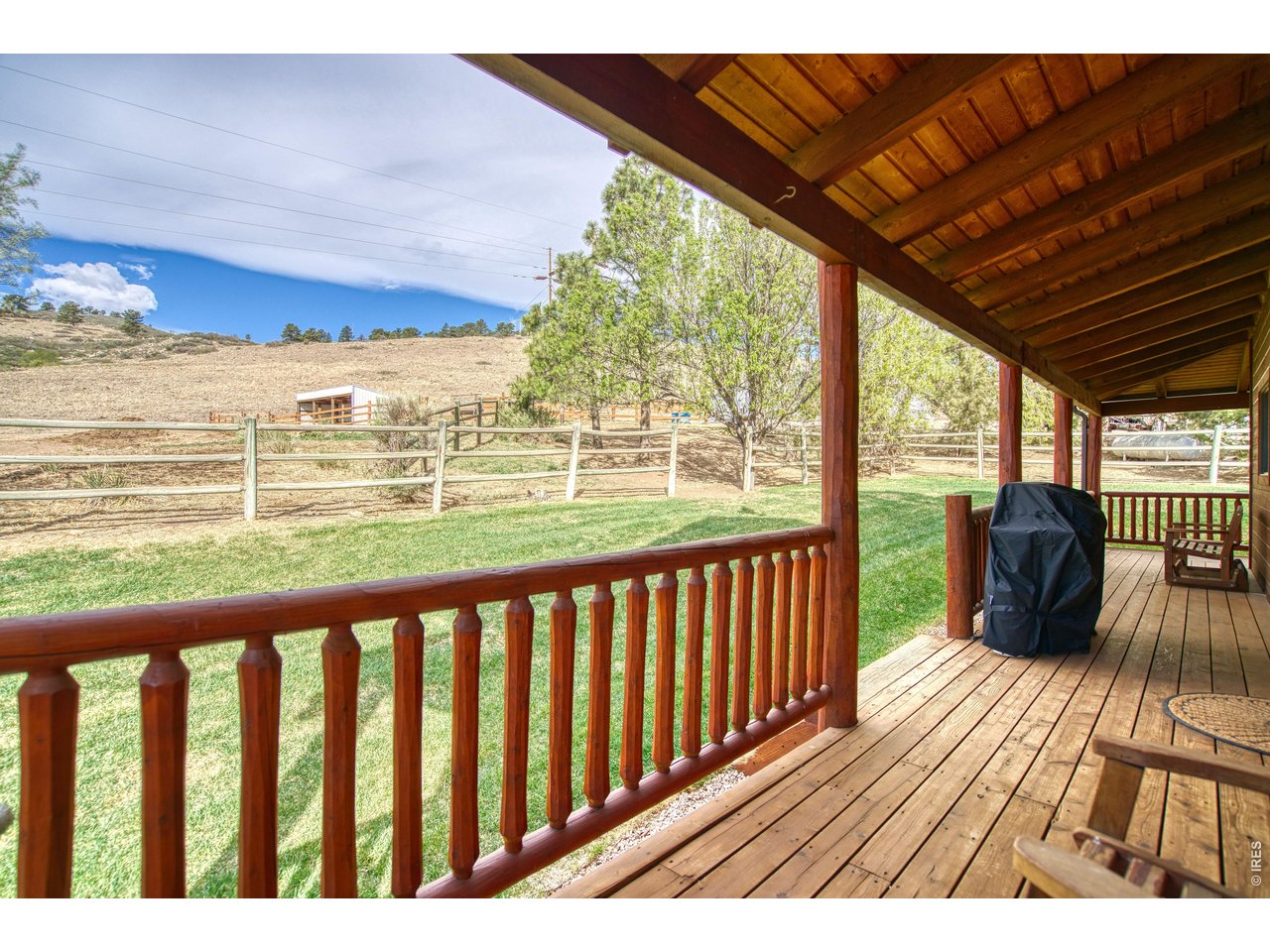 320 Del Monte Road Berthoud, CO 80513 - Photo 6 of 40 a view of balcony with wooden floor