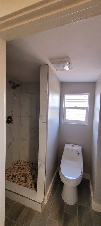 104 Hub Street Alice, TX 78332 - Photo 7 of 15 a bathroom with a toilet and a shower