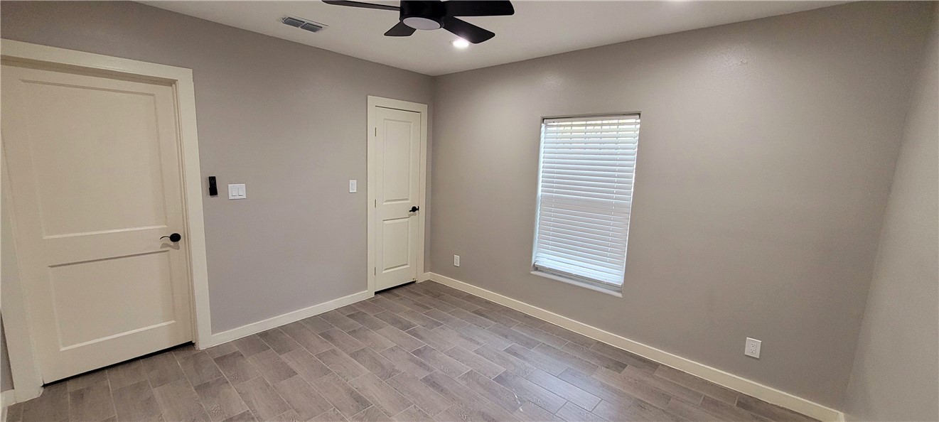 104 Hub Street Alice, TX 78332 - Photo 9 of 15 an empty room with a window