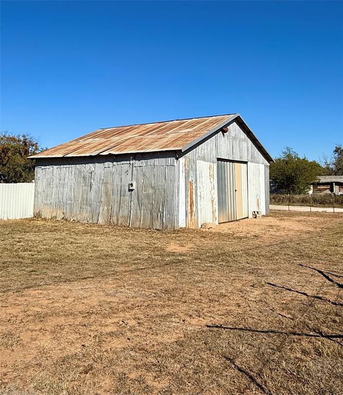 704 Post Street Coleman, TX 76834 - Photo 16 of 40 a view of a house with a yard