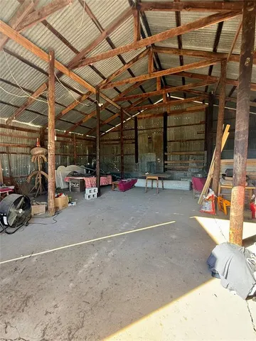 a view of parking garage with cars