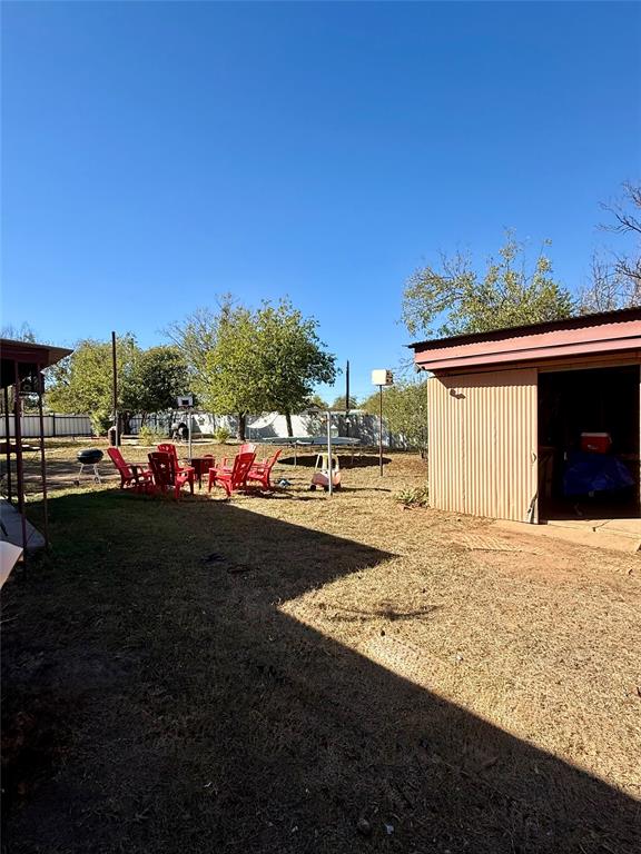 704 Post Street Coleman, TX 76834 - Photo 22 of 40 a view of outdoor space yard and lake