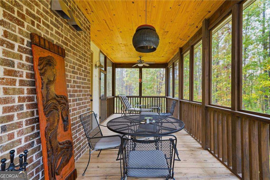 2197 Damascus Road Ball Ground, GA 30107 - Photo 39 of 39 a view of a balcony with table and chairs