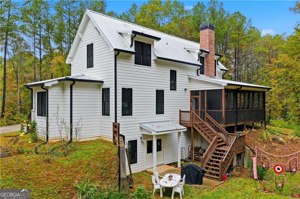 2197 Damascus Road Ball Ground, GA 30107 - Photo 5 of 39 a view of a house with backyard
