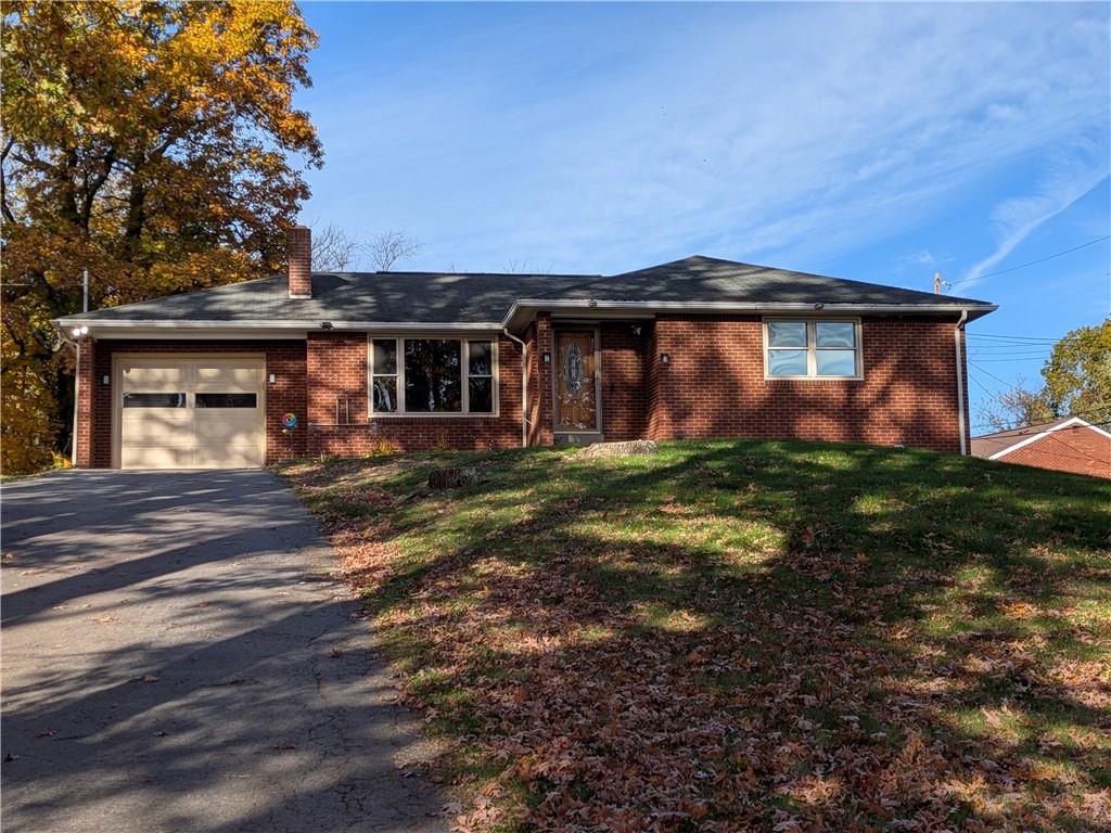 338 Moon Clinton Road Coraopolis, PA 15108 - Photo 4 of 13 front view of a house with a yard