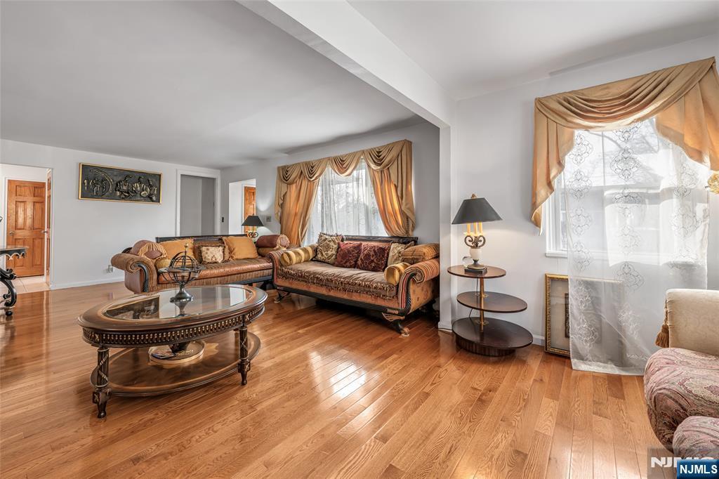 17 Porter Road West Orange, NJ 07052 - Photo 11 of 32 a living room with furniture and a window