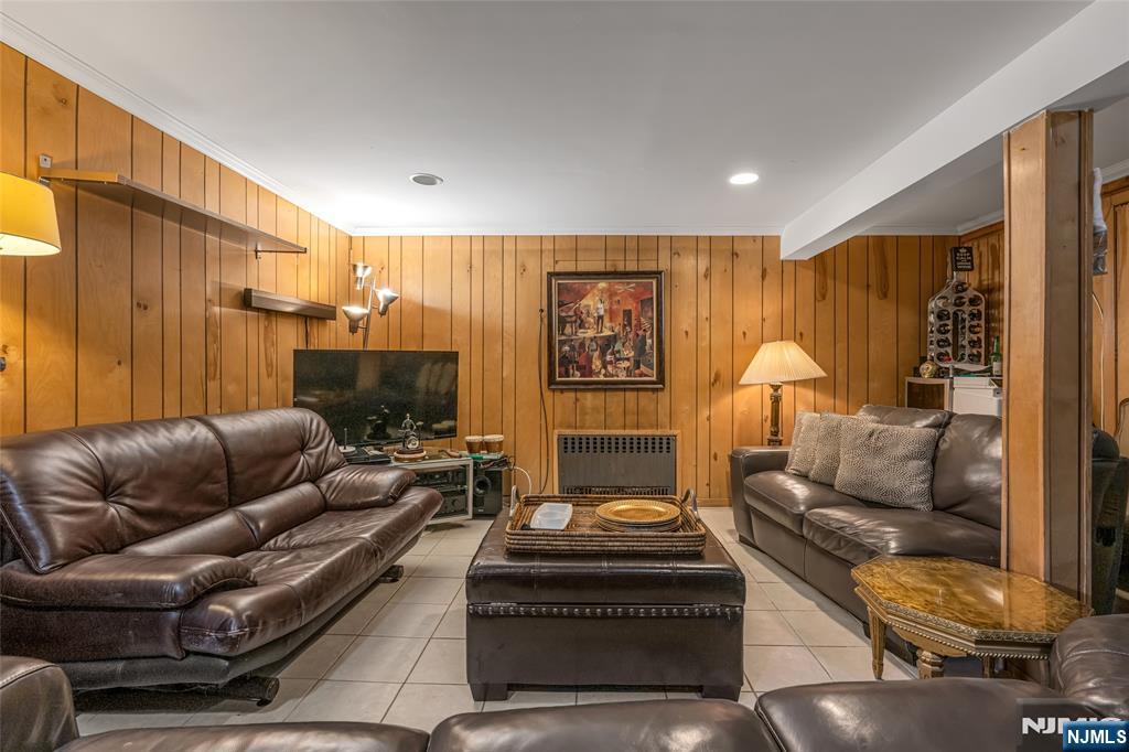 17 Porter Road West Orange, NJ 07052 - Photo 23 of 32 a living room with furniture and a fireplace