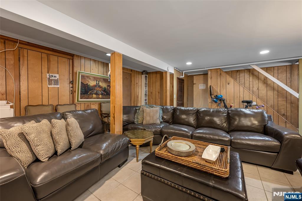 17 Porter Road West Orange, NJ 07052 - Photo 26 of 32 a living room with furniture and a couch