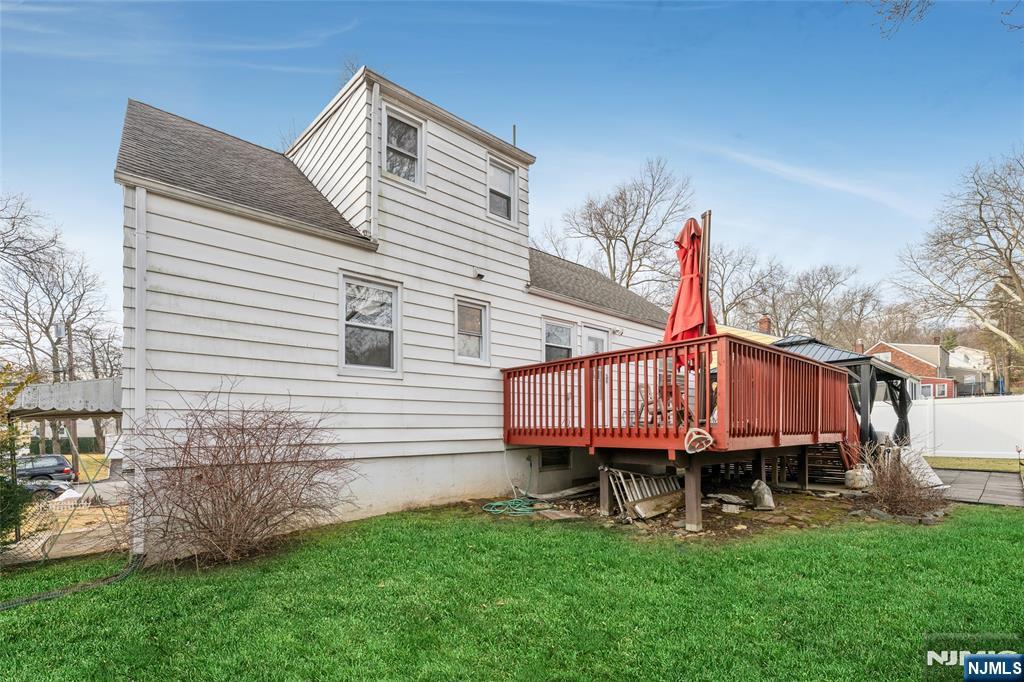 17 Porter Road West Orange, NJ 07052 - Photo 32 of 32 a front view of a house with a yard table and chairs