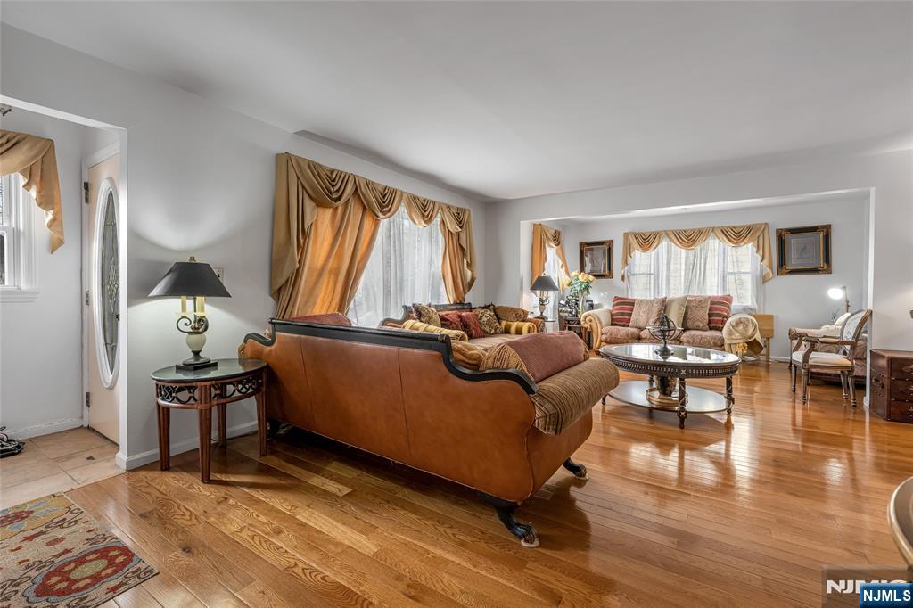 17 Porter Road West Orange, NJ 07052 - Photo 5 of 32 a living room with furniture window and wooden floor
