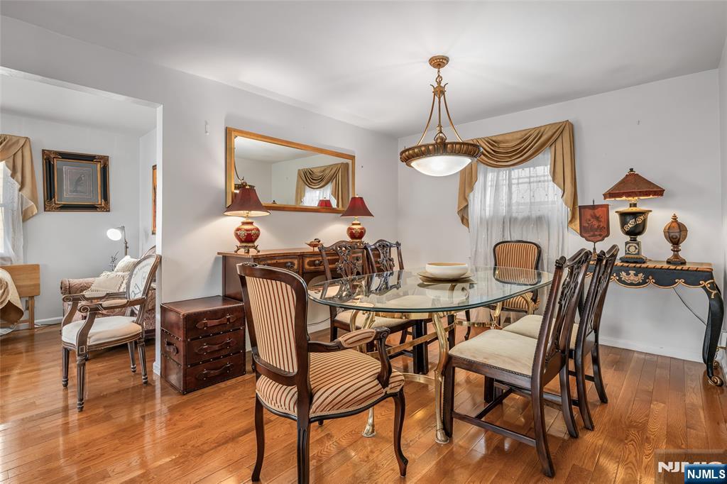 17 Porter Road West Orange, NJ 07052 - Photo 9 of 32 a view of a dining room with furniture window and wooden floor