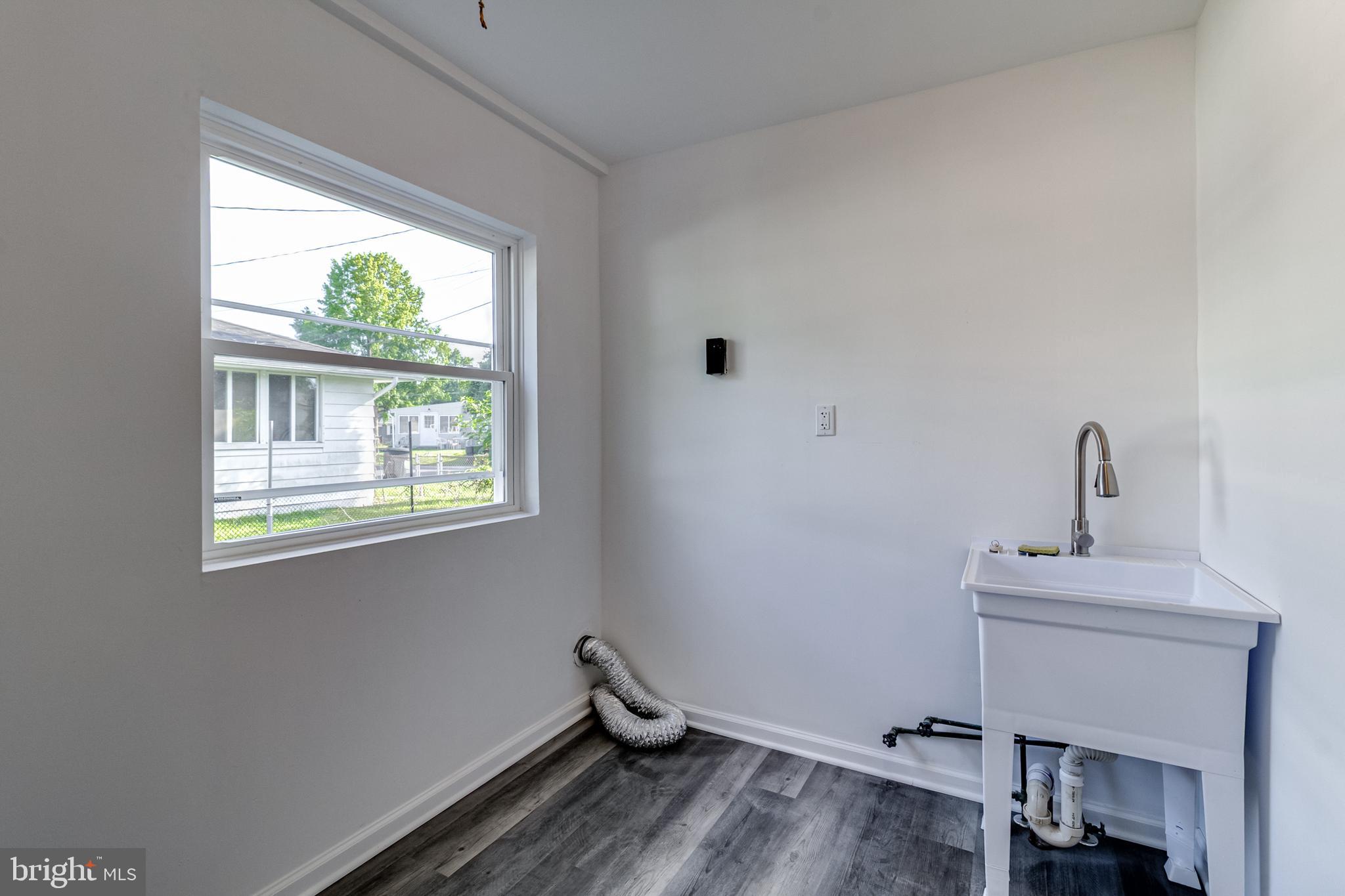 1318 Wilson Point Road Baltimore, MD 21220 - Photo 19 of 26 Laundry Room
