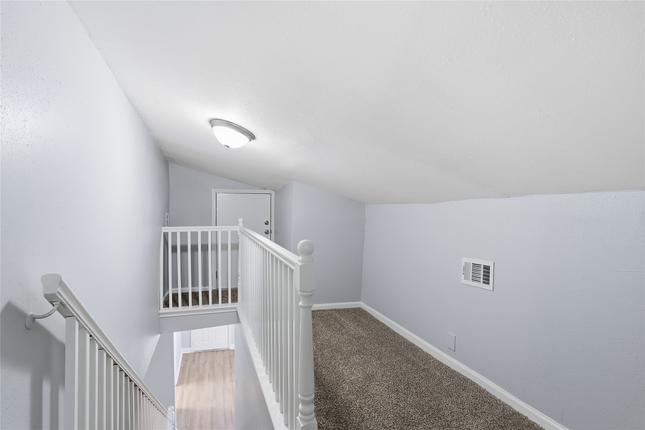 1707 Johnson Street Pasadena, TX 77502 - Photo 19 of 45 a view of a hallway with stairs
