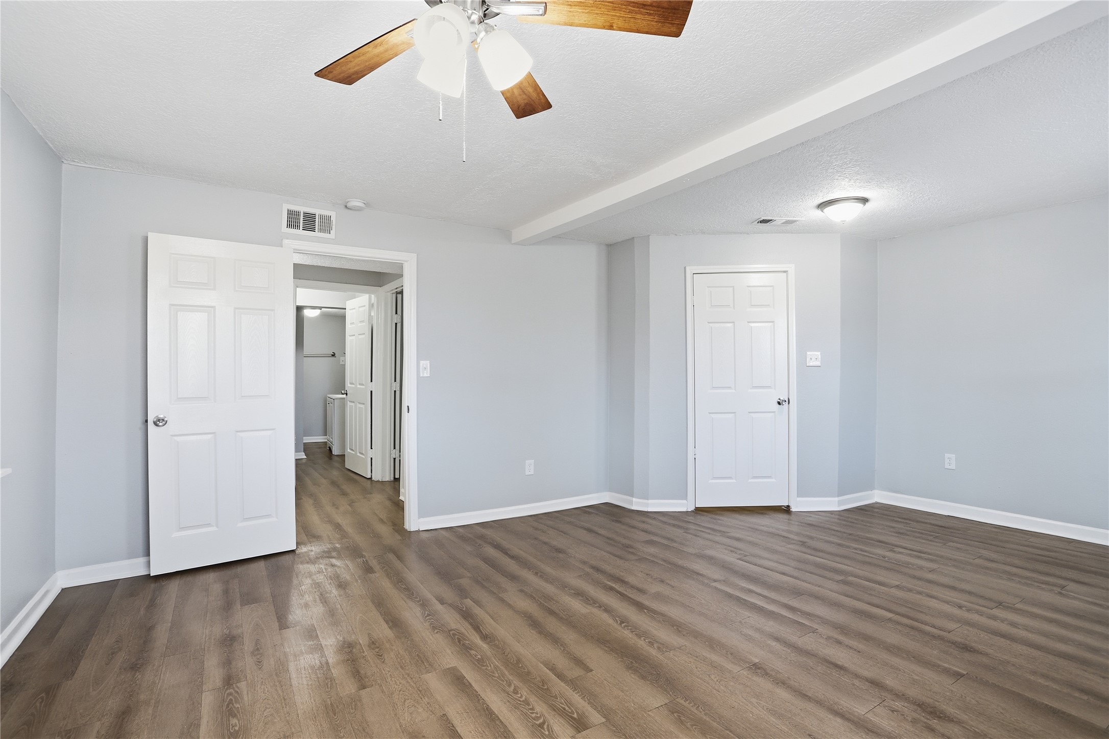 1707 Johnson Street Pasadena, TX 77502 - Photo 26 of 45 a view of an empty room with wooden floor
