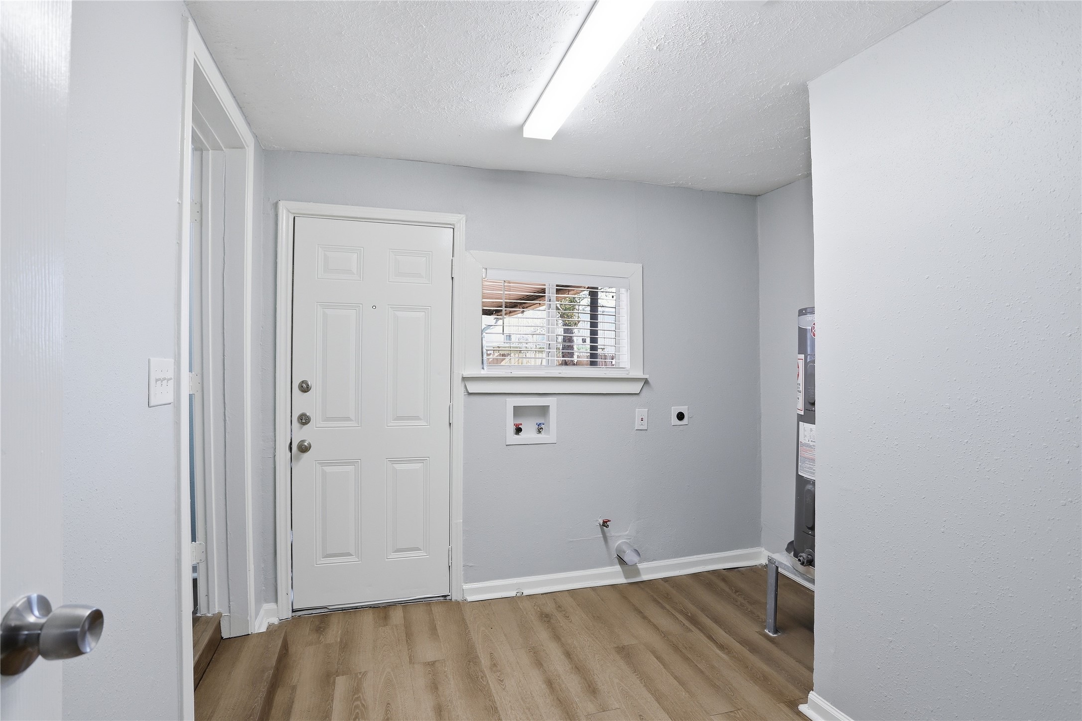1707 Johnson Street Pasadena, TX 77502 - Photo 37 of 45 a view of a room with wooden floor and windows