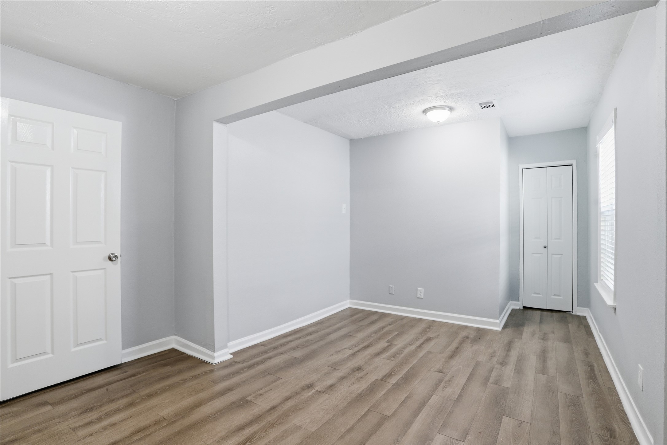 1707 Johnson Street Pasadena, TX 77502 - Photo 39 of 45 a view of an empty room with wooden floor