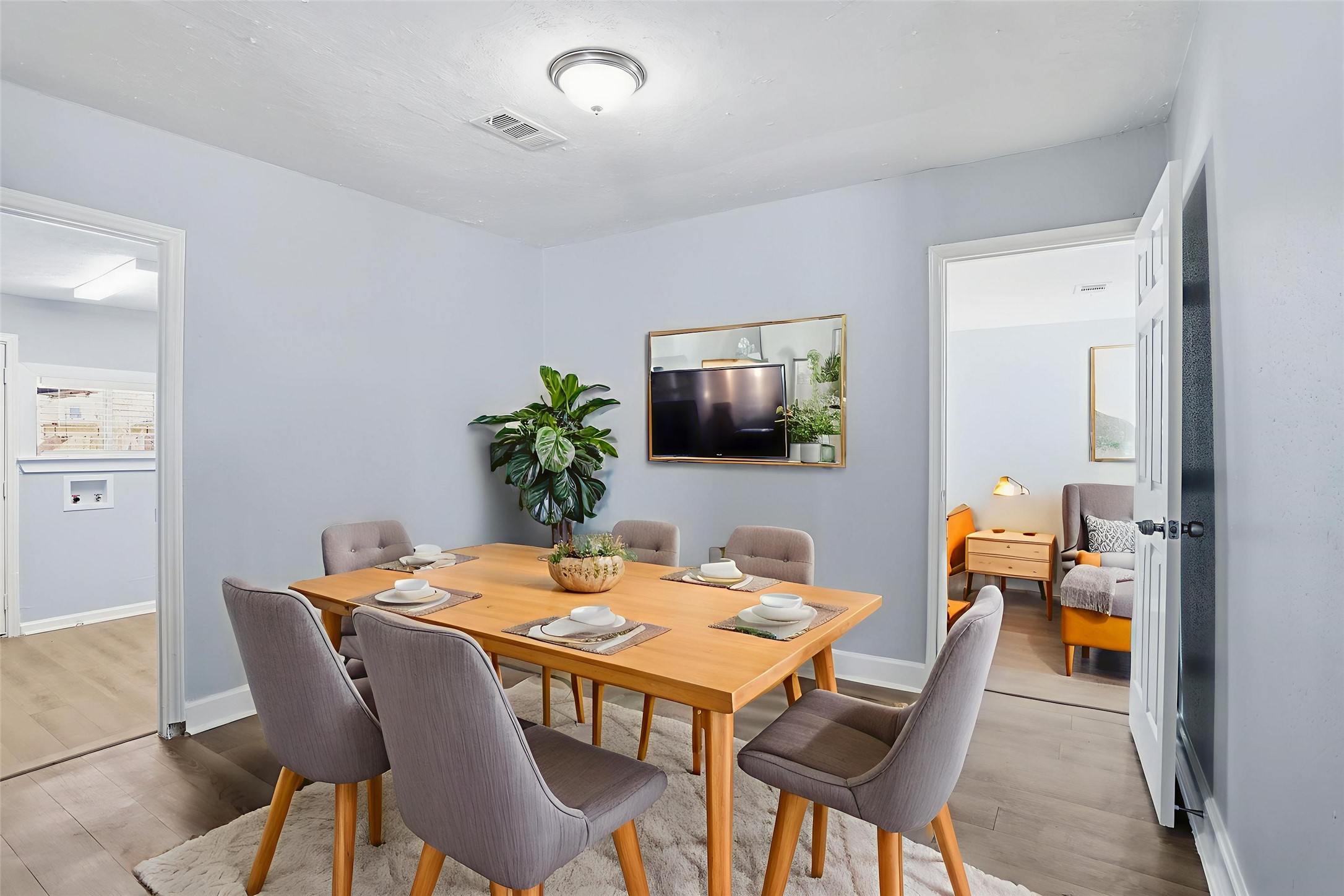 1707 Johnson Street Pasadena, TX 77502 - Photo 6 of 45 a dining room with furniture and wooden floor