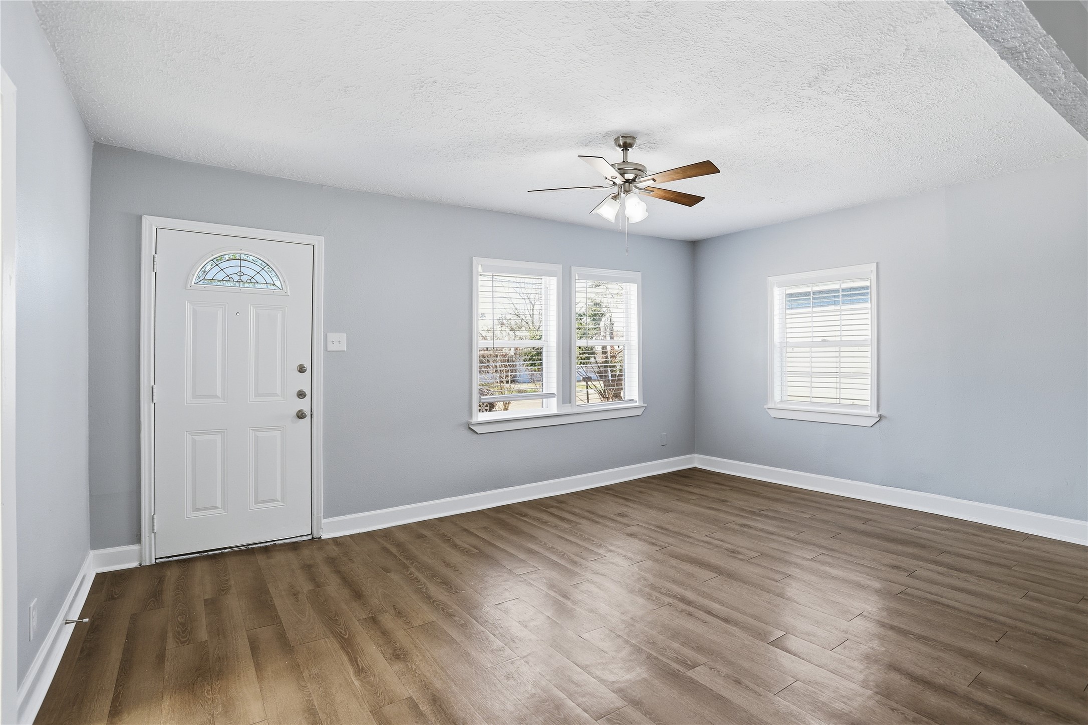 1707 Johnson Street Pasadena, TX 77502 - Photo 10 of 45 a view of an empty room with a window