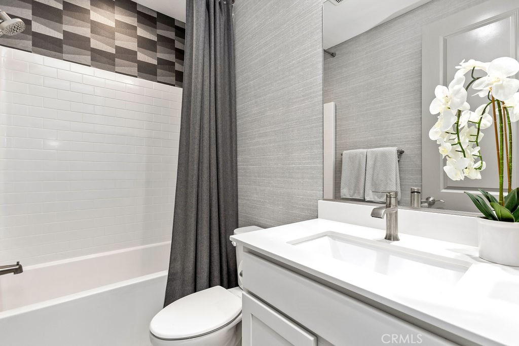 663 Longhorn Way Rancho Mission Viejo, CA 92694 - Photo 15 of 52 a bathroom with a sink a toilet and shower