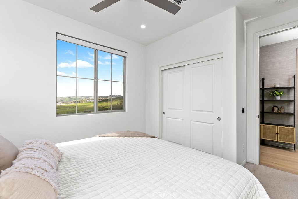 663 Longhorn Way Rancho Mission Viejo, CA 92694 - Photo 20 of 52 a bedroom with a bed and a window