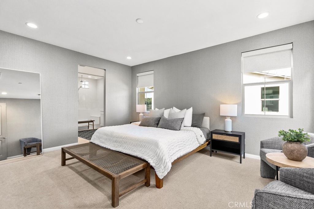 663 Longhorn Way Rancho Mission Viejo, CA 92694 - Photo 25 of 52 a spacious bedroom with a bed and a couch