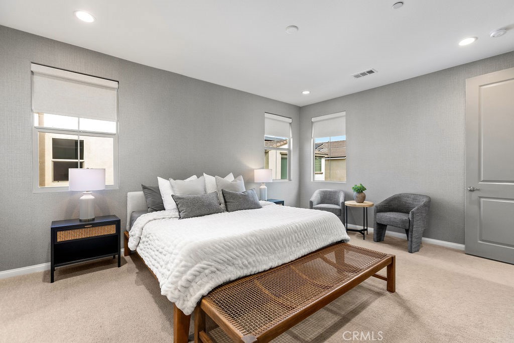663 Longhorn Way Rancho Mission Viejo, CA 92694 - Photo 26 of 52 a bedroom with a bed and a chair