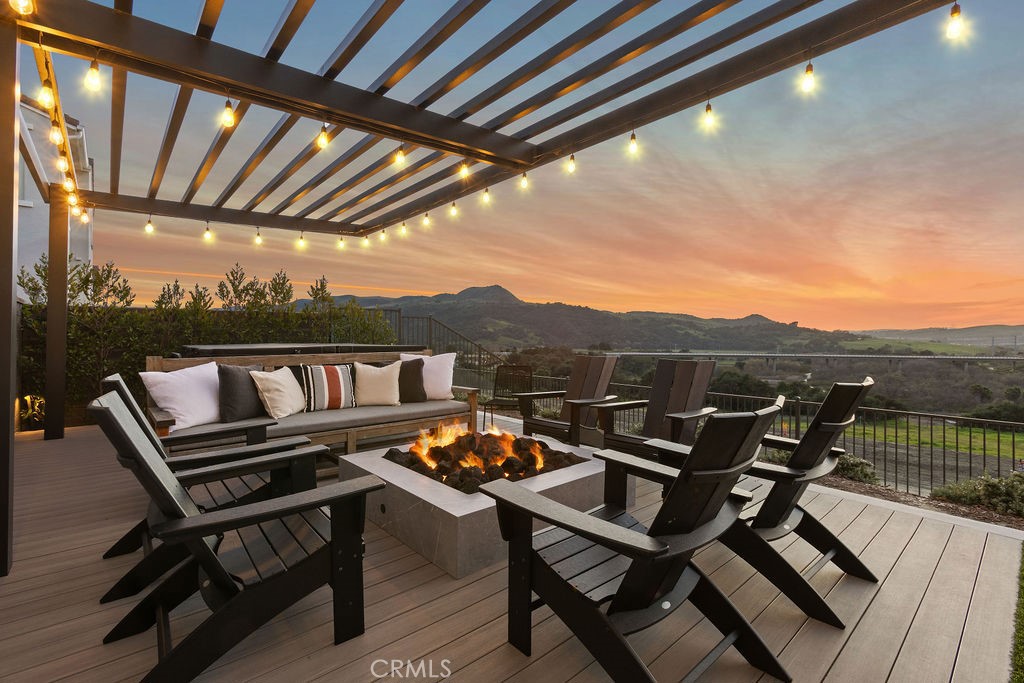 663 Longhorn Way Rancho Mission Viejo, CA 92694 - Photo 30 of 52 a view of a roof deck with couches and wooden floor