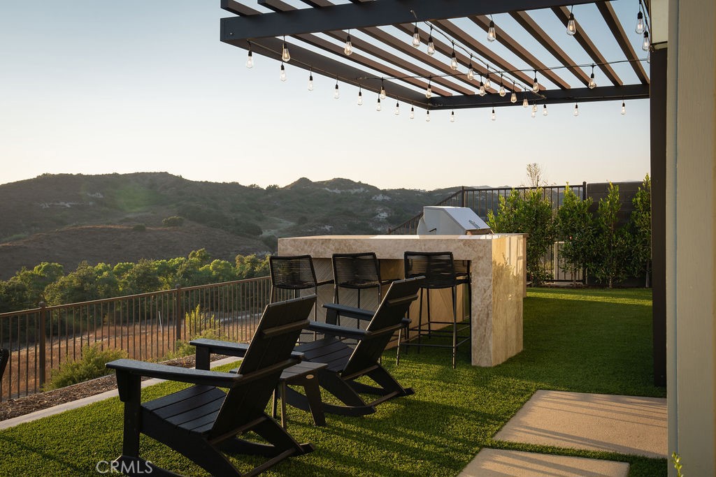 663 Longhorn Way Rancho Mission Viejo, CA 92694 - Photo 38 of 52 a view of a chairs and table on the terrace