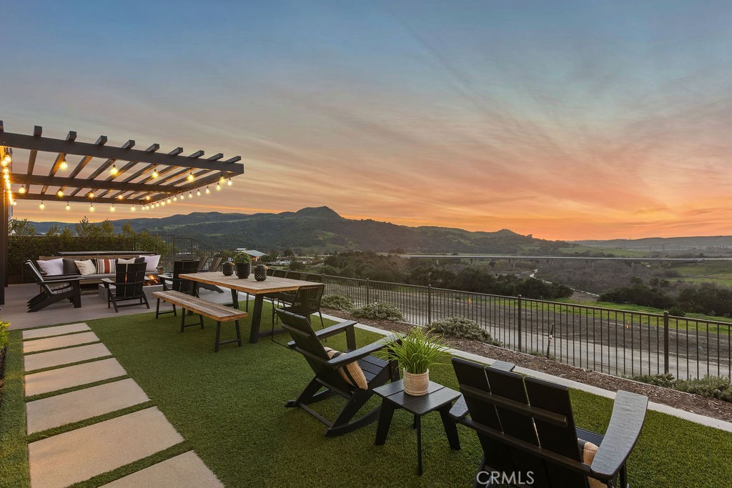 663 Longhorn Way Rancho Mission Viejo, CA 92694 - Photo 39 of 52 a view of a chairs and table in patio
