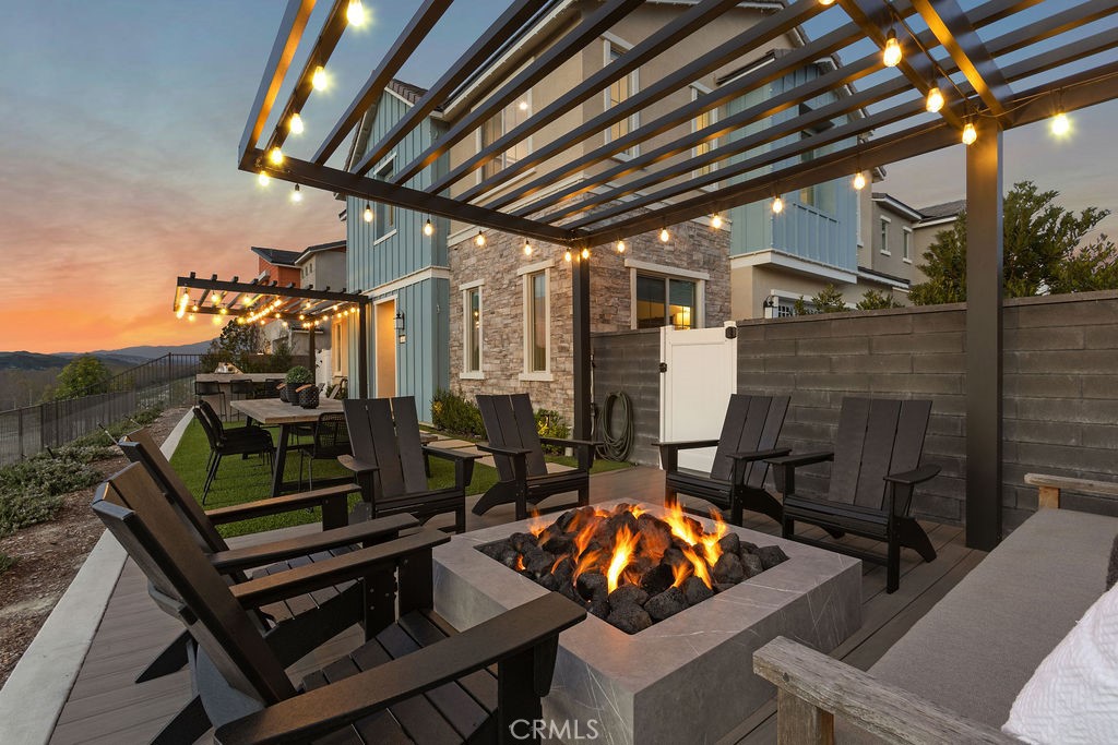 663 Longhorn Way Rancho Mission Viejo, CA 92694 - Photo 40 of 52 a view of a couches and table in the patio