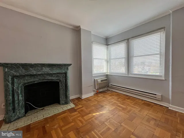 a living room with a fireplace