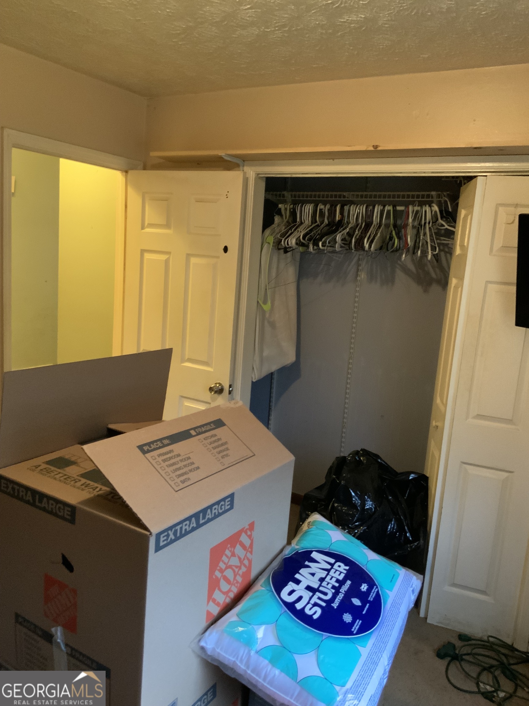 10065 Brass Ring Road Jonesboro, GA 30238 - Photo 16 of 48 a view of storage and utility room