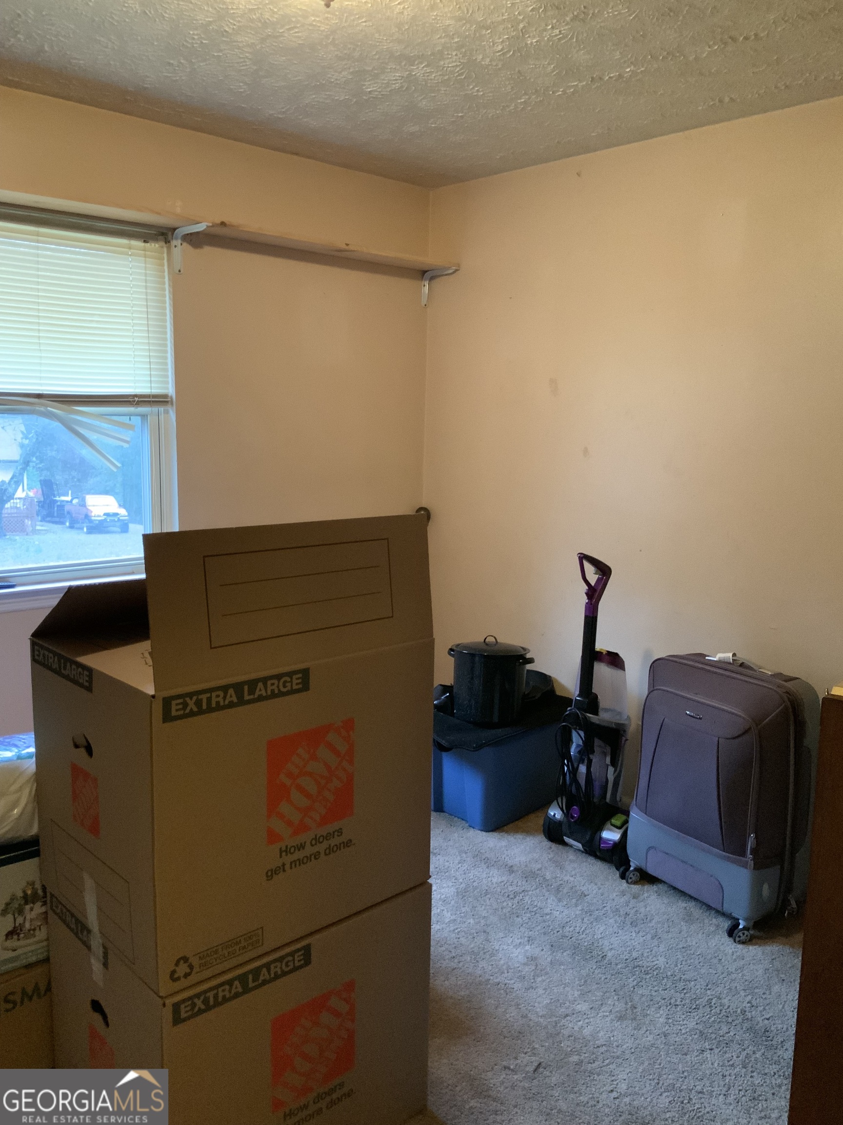 10065 Brass Ring Road Jonesboro, GA 30238 - Photo 17 of 48 a view of storage and utility room
