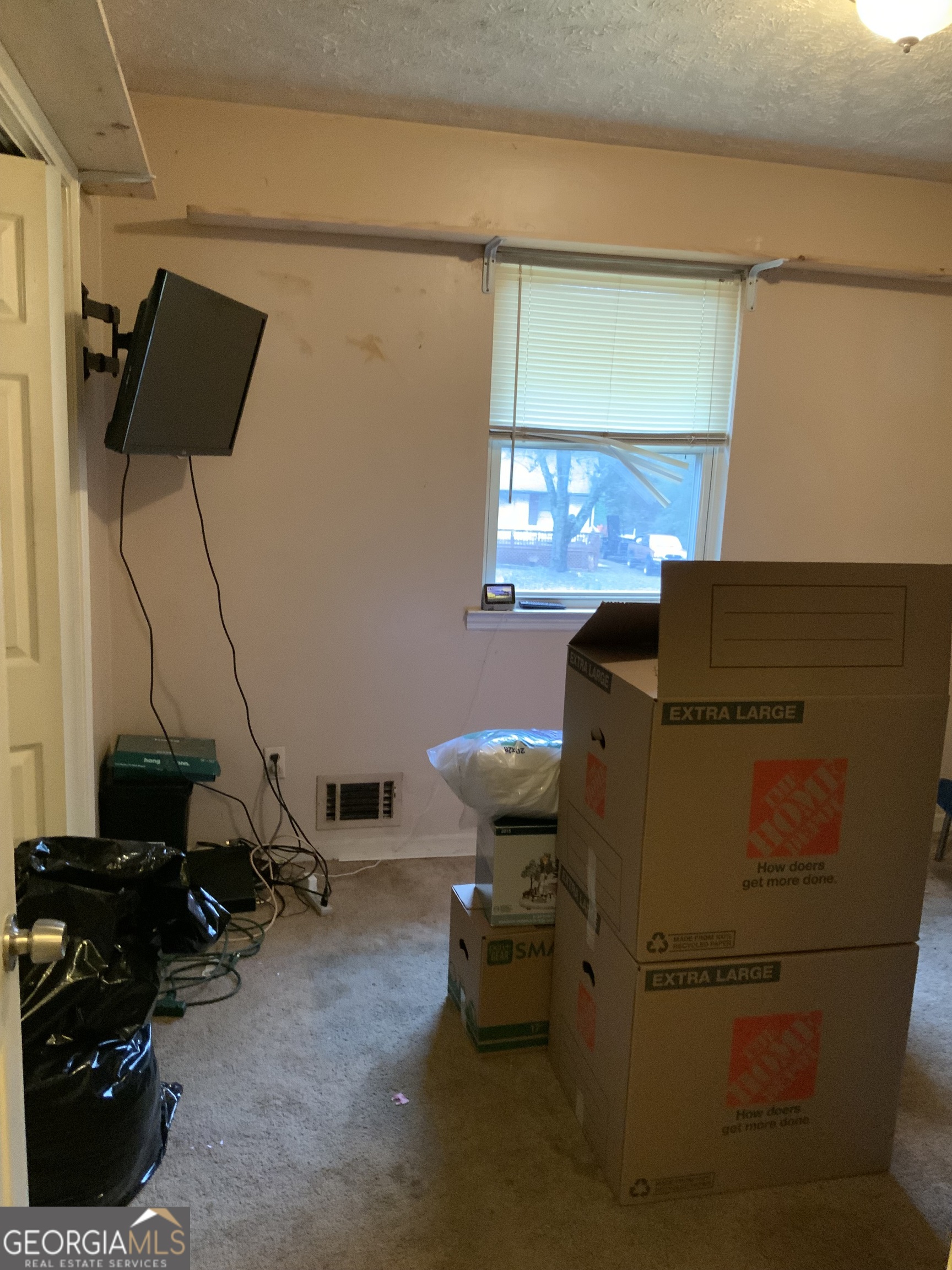 10065 Brass Ring Road Jonesboro, GA 30238 - Photo 18 of 48 a room with storage and utility