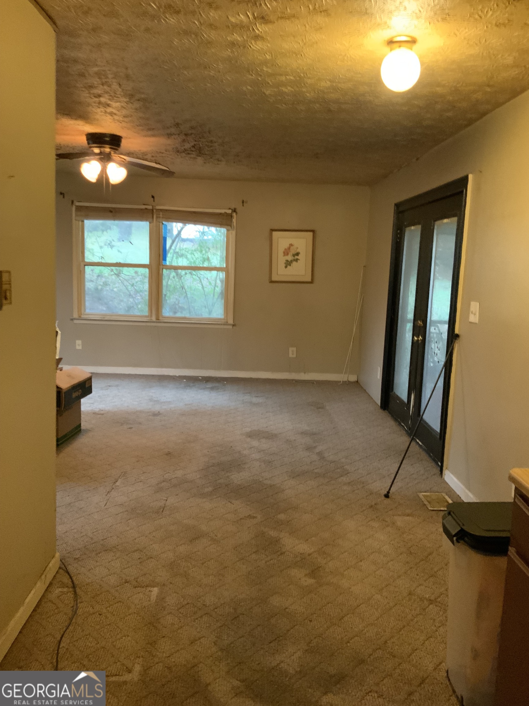 10065 Brass Ring Road Jonesboro, GA 30238 - Photo 27 of 48 a view of an empty room with a window