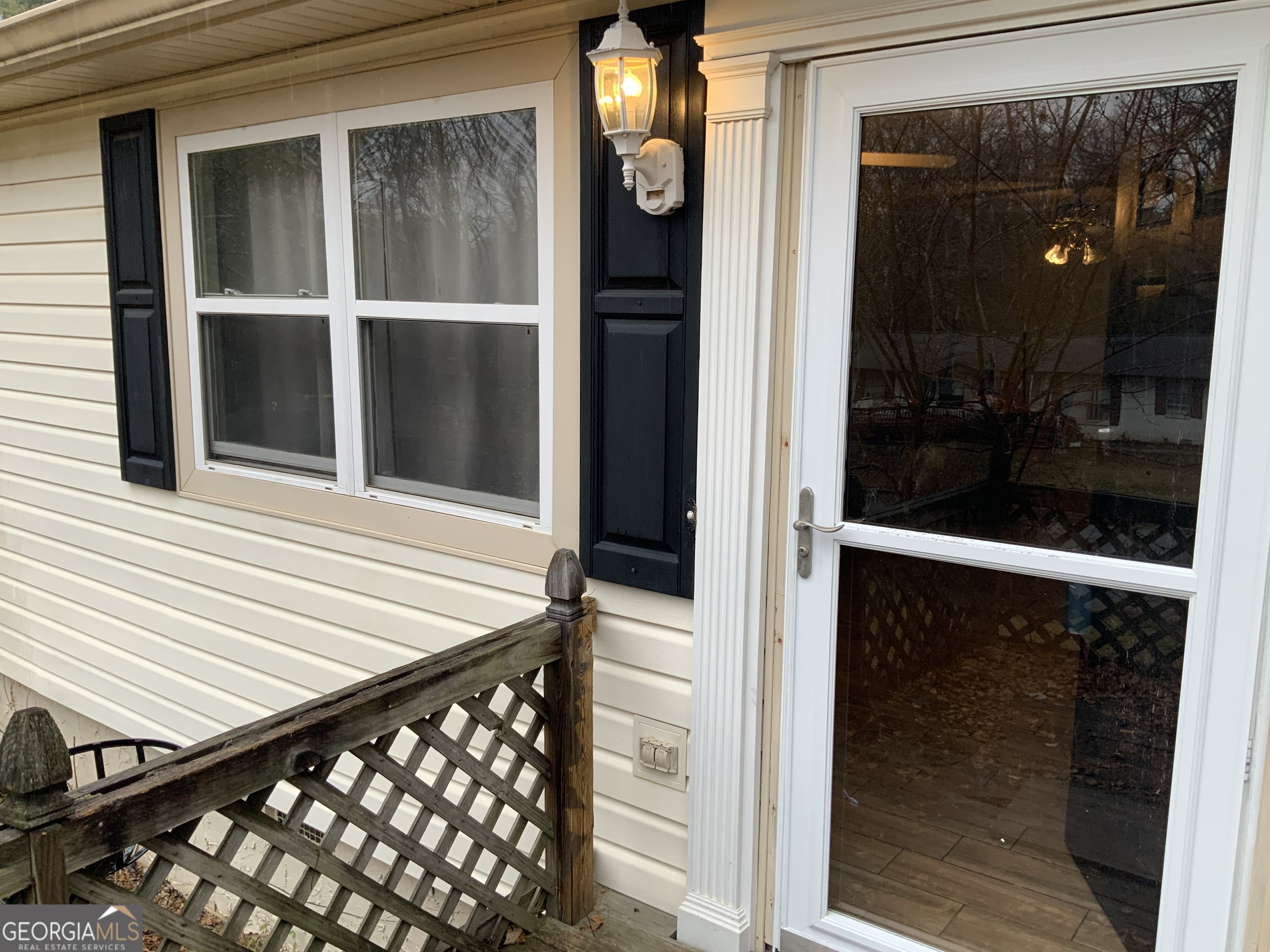10065 Brass Ring Road Jonesboro, GA 30238 - Photo 3 of 48 a view of a balcony with a door