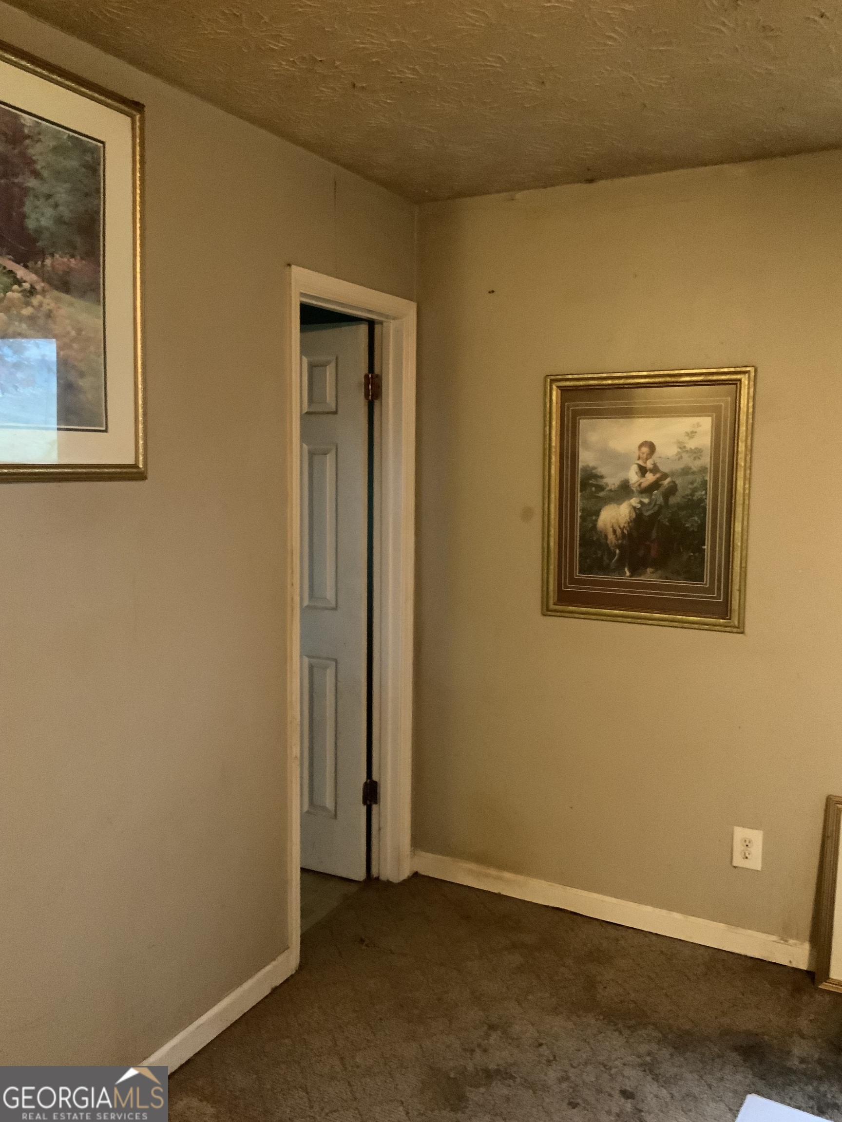 10065 Brass Ring Road Jonesboro, GA 30238 - Photo 31 of 48 a view of a hallway with wooden floor