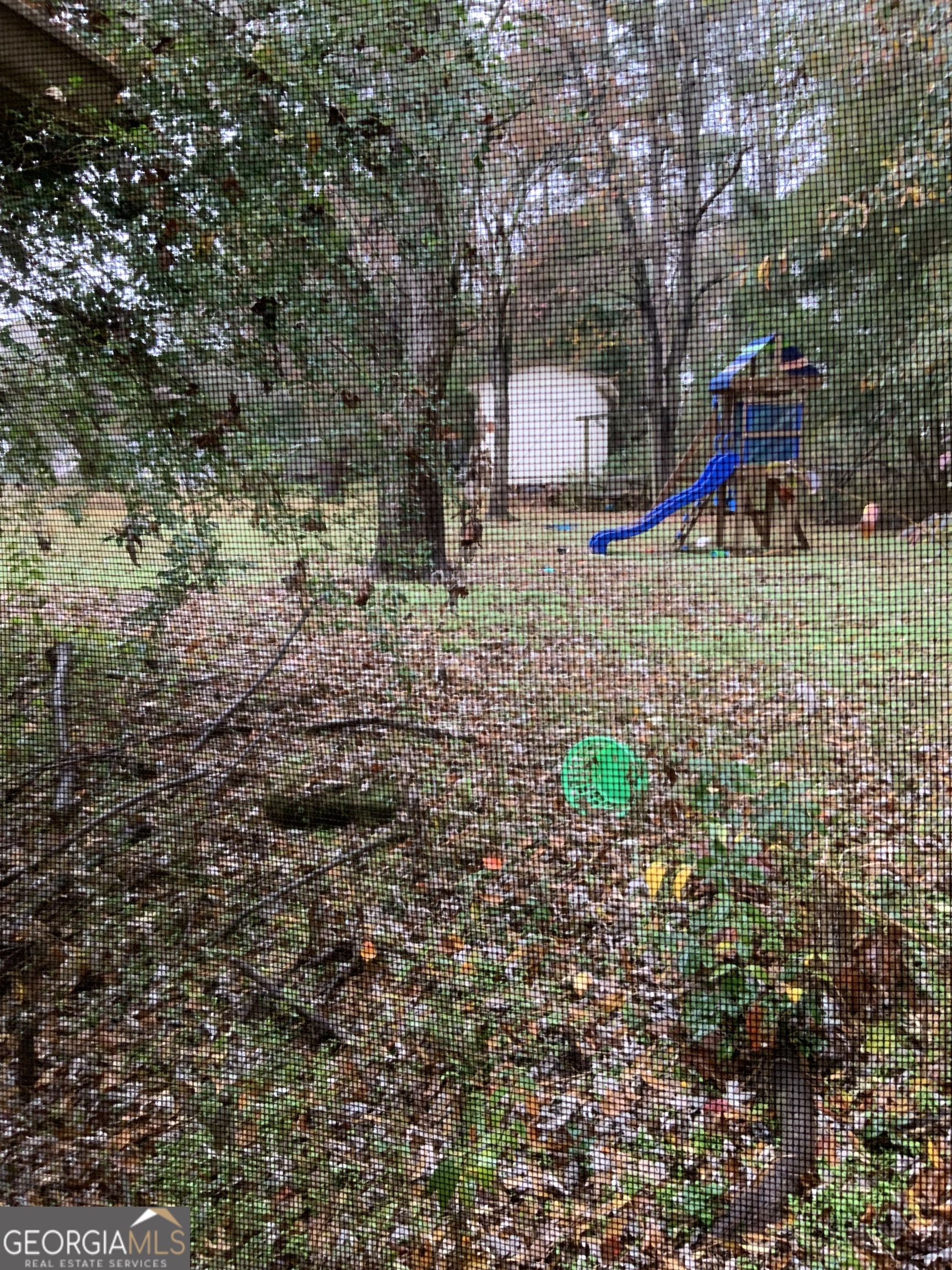 10065 Brass Ring Road Jonesboro, GA 30238 - Photo 40 of 48 a view of outdoor space with playground and green space